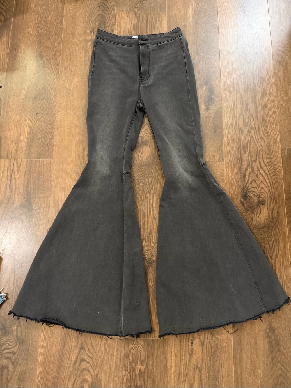Free People Washed Black Flare Jeans with Raw Hem